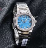 RRR Factory Patek Philippe Nautilus Cal.E 23-250SC Movement 32mm Blue Embossed Wave Pattern Face Women Watch